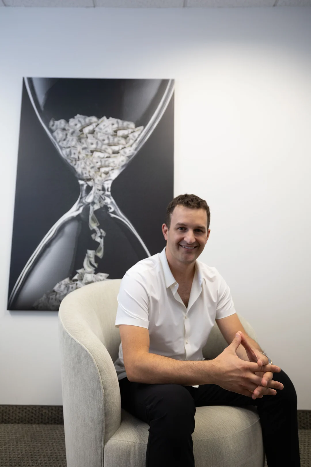 Ringba User Stories - Chris Shihadeh Sitting on a Chair
